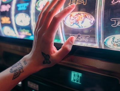 A joyful player celebrating a big win on a slot machine app.